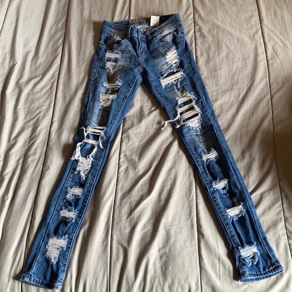 Brand: VIP. Size 00, fits like a 0. Dark colored blue jeans.
